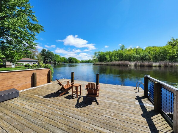 Terrace/patio - Spacious 4-bedroom waterfront house in Sylvan Beach with private yard and dock. (Blossvale)