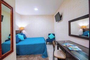 Coffres-forts dans les chambres, fer et planche à repasser