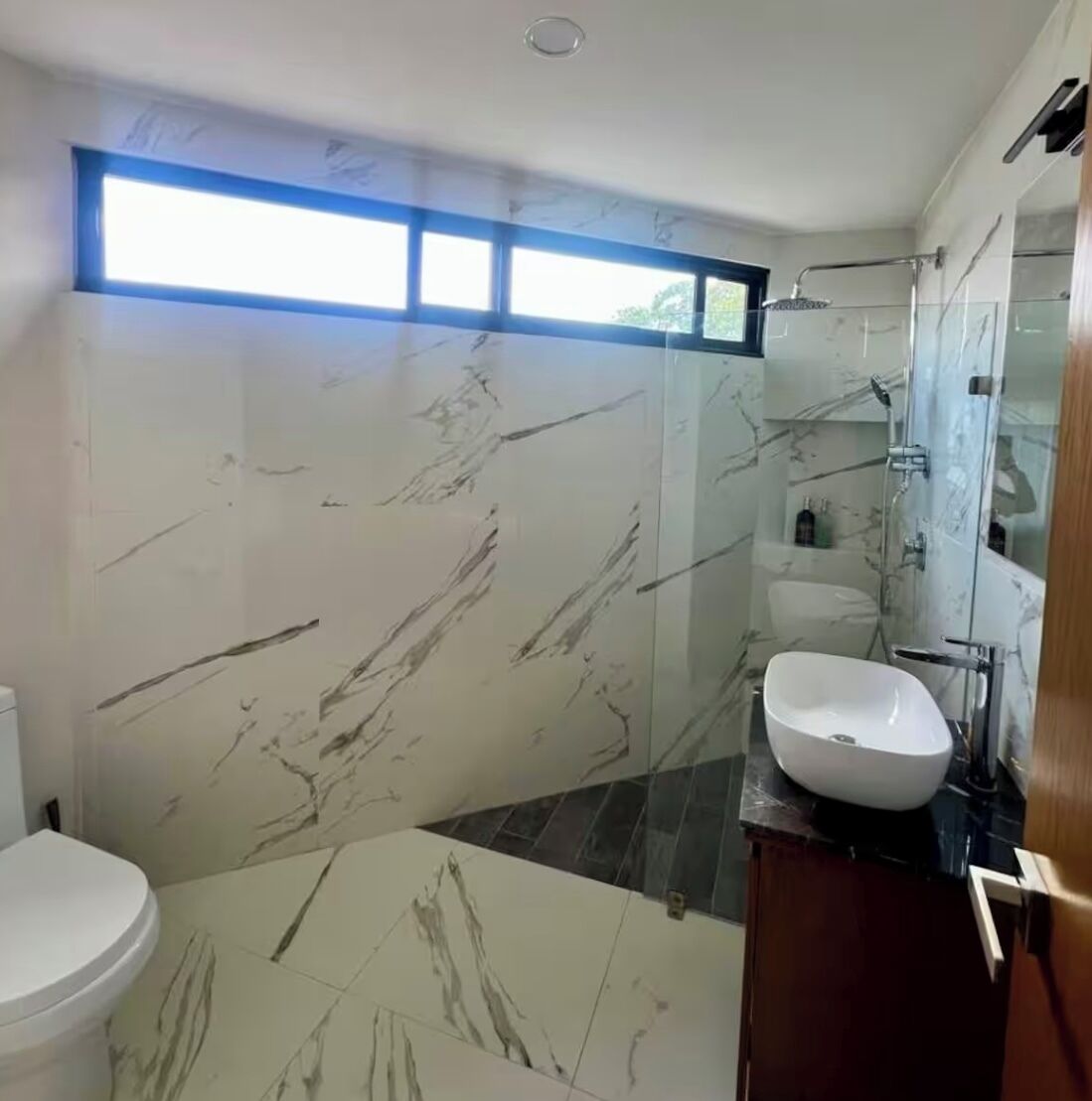 Shower, towels, soap, toilet paper