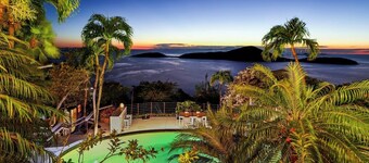 Steps away from the property infinity pool overlooking the nearby keys