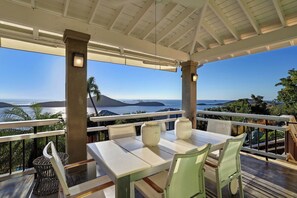 Outdoor dining - Steps away from the property infinity pool overlooking the nearby keys (Culebra)