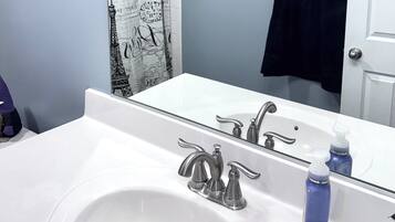 Hair dryer, towels, soap, toilet paper