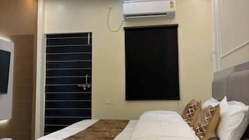 2 habitaciones, tabla de planchar con plancha, wifi y ropa de cama