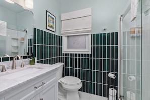 Shower, hair dryer, towels, soap