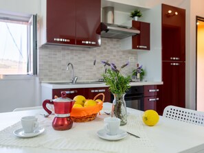 Fridge, microwave, oven, cookware/dishes/utensils