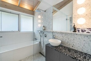 Shower, hair dryer, towels, soap