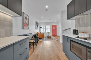 Fridge, microwave, stovetop, coffee/tea maker