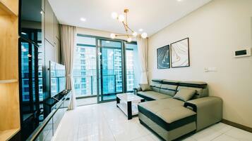 Deluxe Apartment, 1 Bedroom, Balcony, City View | Living area