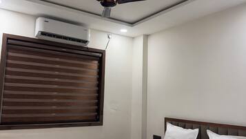 Habitación doble Deluxe | Tabla de planchar con plancha y wifi gratis