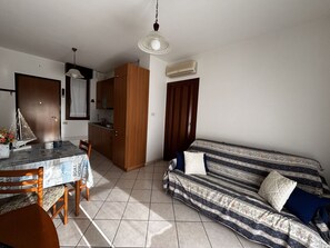 Apartment, 2 Bedrooms, Balcony, Pool View | Living room - Apartment With Pool Near the Beach (Rosolina)