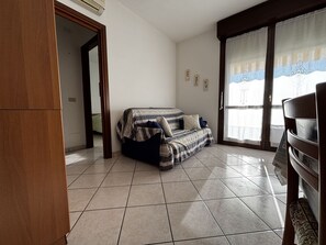 Apartment, 2 Bedrooms, Balcony, Pool View | Living room