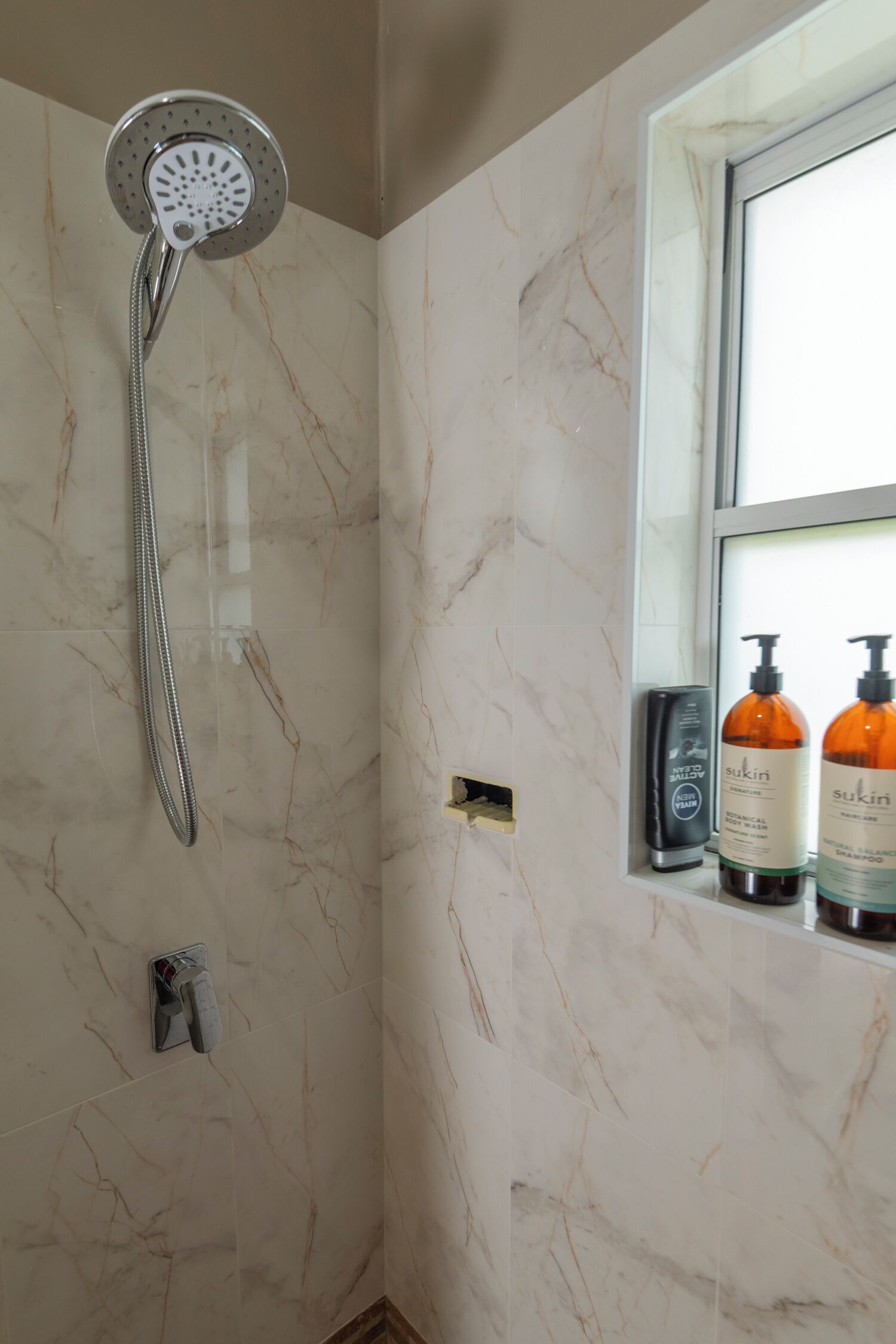 Hair dryer, towels, soap, toilet paper