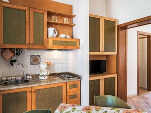 Fridge, microwave, cookware/dishes/utensils