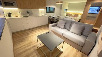 Appartamento Deluxe | Cucina privata | Microonde, forno, piano cottura, bollitore elettrico