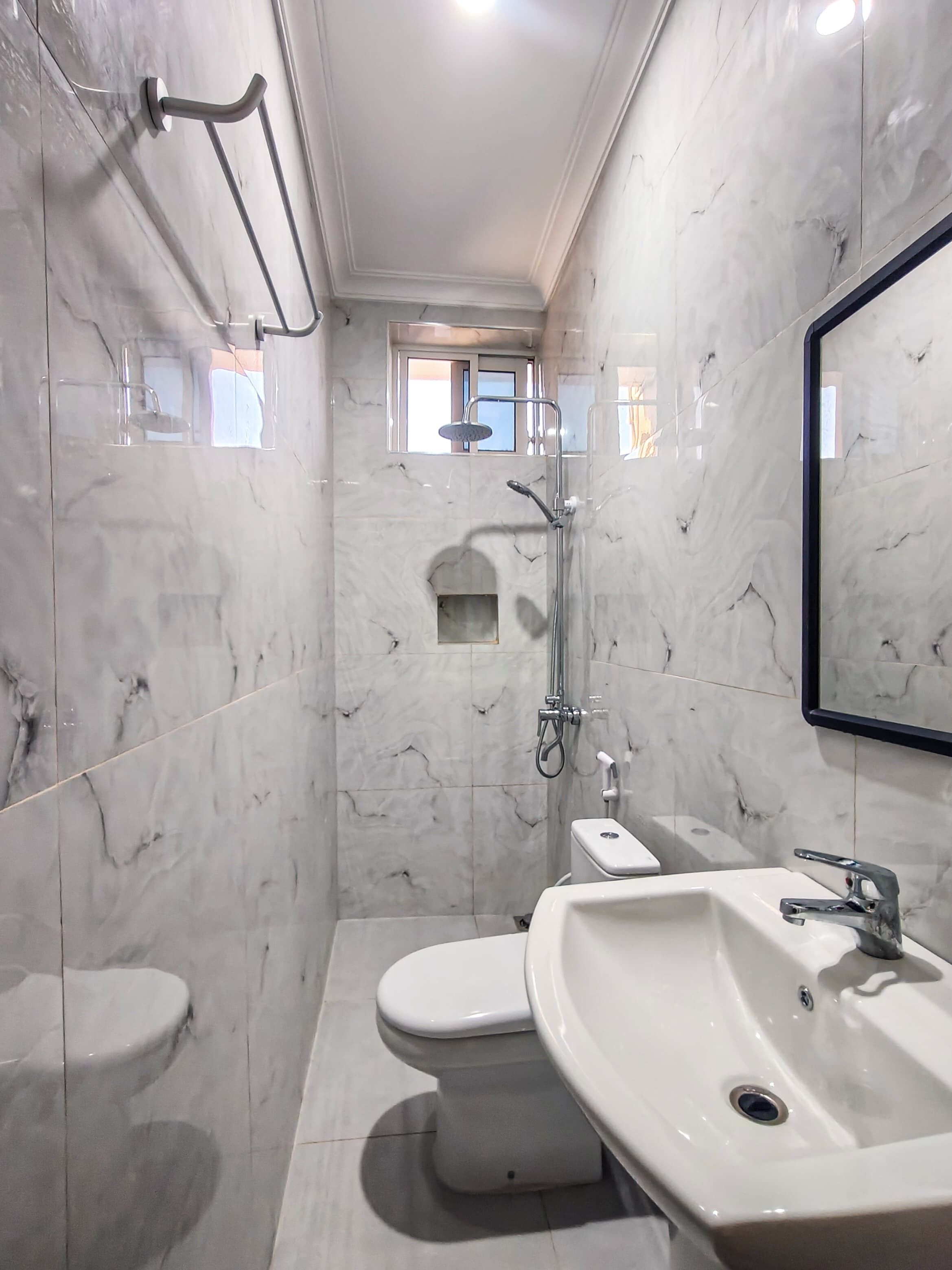 Shower, towels, soap, toilet paper