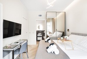 1 habitación, tabla de planchar con plancha, wifi y ropa de cama