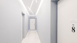 A modern hallway with a marble floor, a door at the end, and a number '8' on the wall. - Easylife - Duomo Deluxe Apartments #5 (Milano)