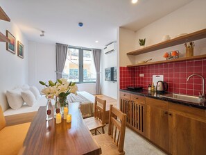 Appartement, balcon, vue ville | 1 chambre, fer et planche à repasser, Wi-Fi gratuit