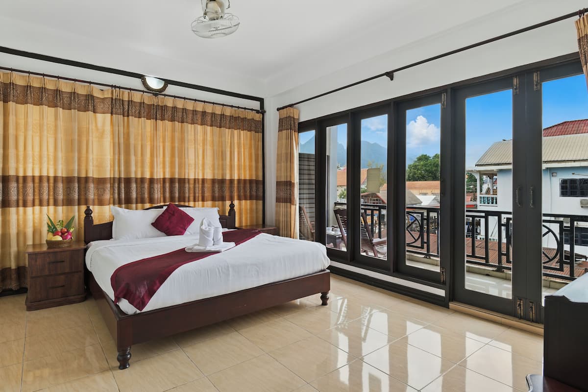 Deluxe Double Room, Balcony, City View | Memory foam beds, minibar, individually decorated