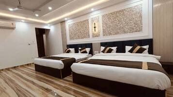 Family Room, Balcony, City View | Living area | 32-inch Smart TV with cable channels