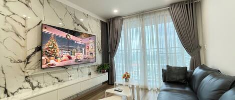 Appartamento Deluxe, 3 camere da letto, non fumatori, vista città | Area soggiorno