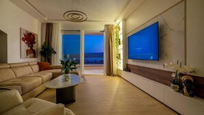 Luxe penthouse, uitzicht op zee | Woonruimte