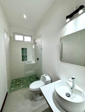 Shower, towels, soap, shampoo