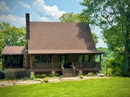 Exterior. Quiet, cozy, cabin apartment in the woods.
