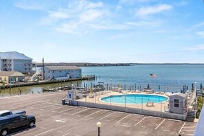 Pool - 1st Floor Direct Bayfront 1 bedroom Updated Condo with pool overlooking the bay! (Ocean City)