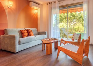 Apartment, 2 Bedrooms, Air conditioning, Beachside | Living area | Flat-screen TV, ping pong - Les 15 Pins & La Mer -  Riviera Escape Apartments with Pool & Garden (Antibes)