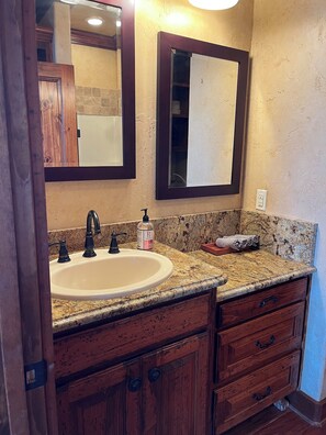 Shower, towels, shampoo, toilet paper