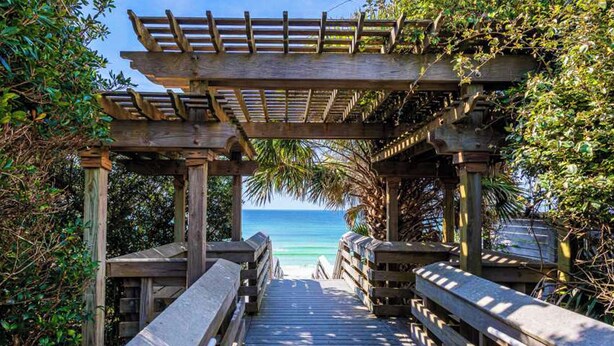 A wooden pathway leading to a beach with a pergola overhead. - 🌊Endless Gulf Views-Luxury Condo with Private Beach-Viridian 202 on 30A🌊 (Santa Rosa Beach)