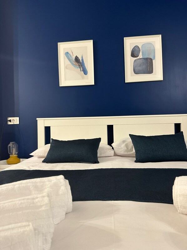 Deluxe Triple Room, Balcony | 1 bedroom, in-room safe, desk, blackout drapes