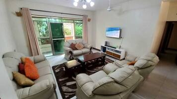Family Apartment, Balcony, City View | Living area