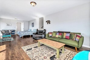 Signature Cabin, 2 Bedrooms, Patio, Mountain View | Living area | 50-inch Smart TV with digital channels, fireplace, foosball - Dee's Cozy Cottage (Waynesville)