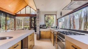 Coffee/tea maker, fridge, microwave, oven