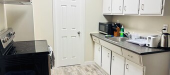Main Floor 1 Bedroom Suite with Parking