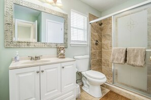 Shower, hair dryer, towels, soap