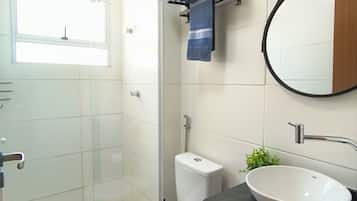 Shower, hair dryer, towels, toilet paper