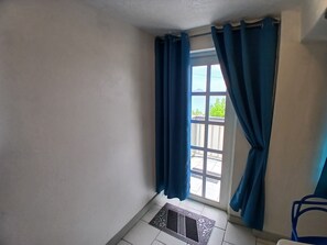 Interior - 2-bedroom apartment in Cane Garden Bay with AC, WiFi, right on the beach front (Cane Garden Bay)