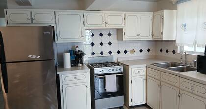 2-bedroom apartment in Cane Garden Bay with AC, WiFi, right on the beach front