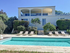 Outdoor pool, a heated pool - Amazing villa with exceptional sea view, swimming pool, sleeps 12 (Lumio)