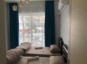 Quarto duplo, sacada, vista para a cidade | 1 quarto, Wi-Fi de cortesia