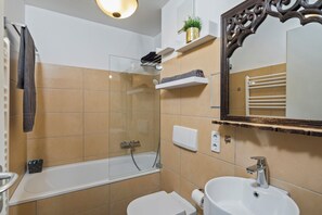 Hair dryer, towels, soap, toilet paper