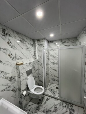 Exclusive Apartment, 1 Bedroom, Balcony, City View | Bathroom | Shower, hair dryer, towels, soap
