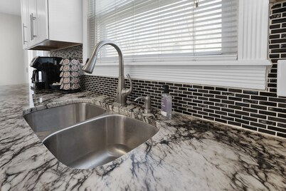 Spacious 5-bedroom house in delightful Indianapolis wit hot tub and gameroom!