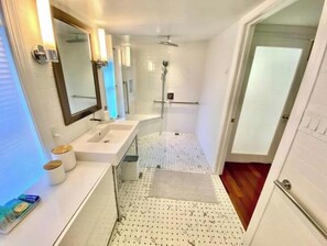Shower, hair dryer, towels, soap