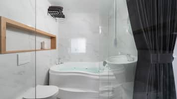 Jetted tub, towels, soap, toilet paper