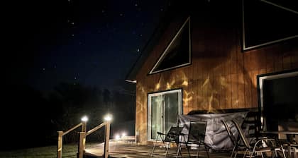 4-bedroom north woods, pet friendly cabin with WiFi, great room and fire place.