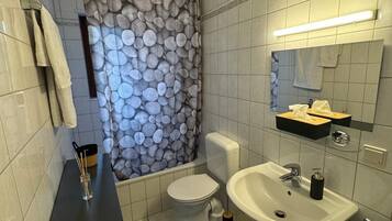 Hair dryer, towels, soap, toilet paper